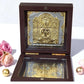 Jain Tirthankar Yantra in polished wooden box with glass, plated in 24K gold, symbolizing peace and balance.
