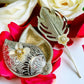Shankh-Shaped paan box - German Silver Haldi Kumkum Box with stick(3 options) Vanika Creations